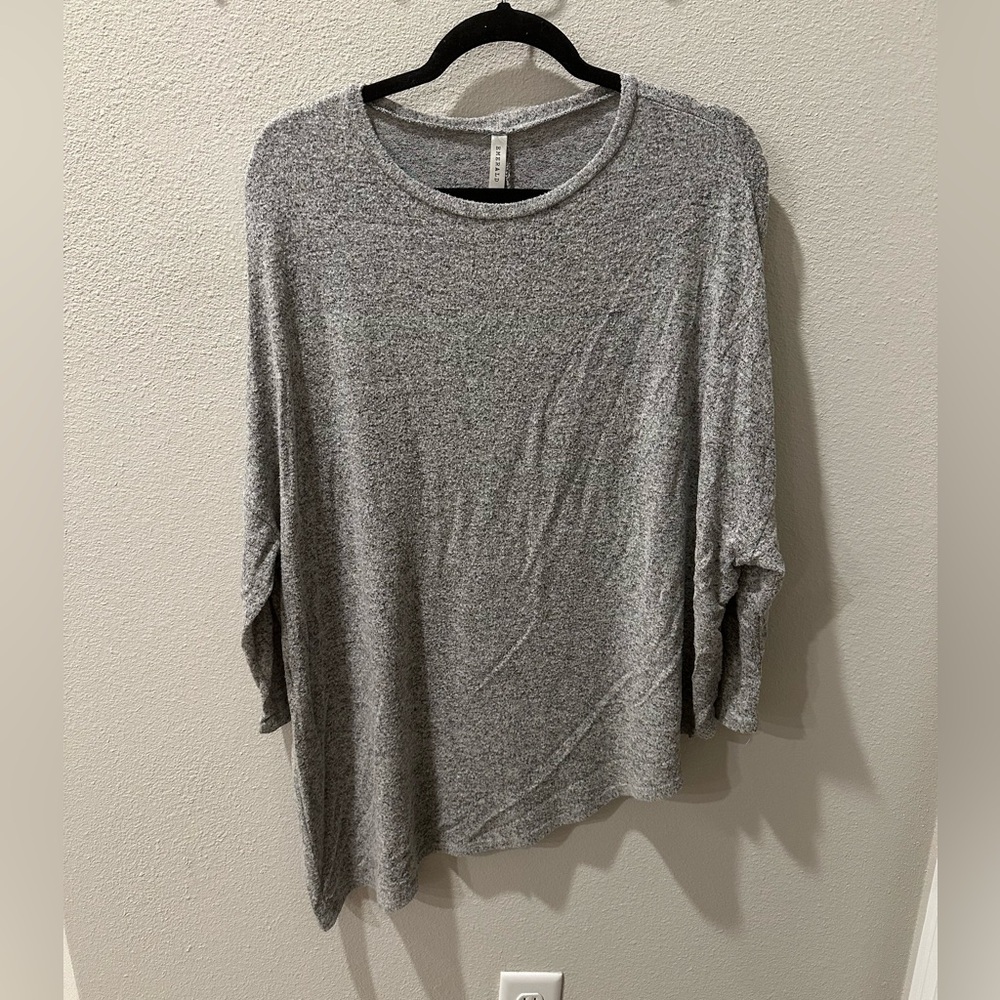 Top with asymmetrical hem